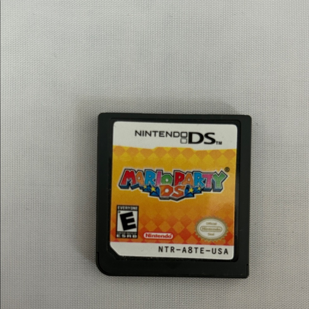 Nintendo DS Mario Party Game Cartridge - in the palm of your hand.